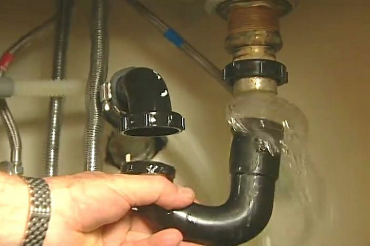 Clearing A Clogged Sink Drain By Cleaning The P Trap